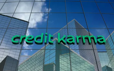 Credit Karma logo on glass. Intuit is acquiring Credit Karma.