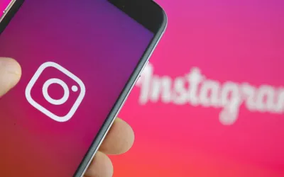 Instagram logo in phone