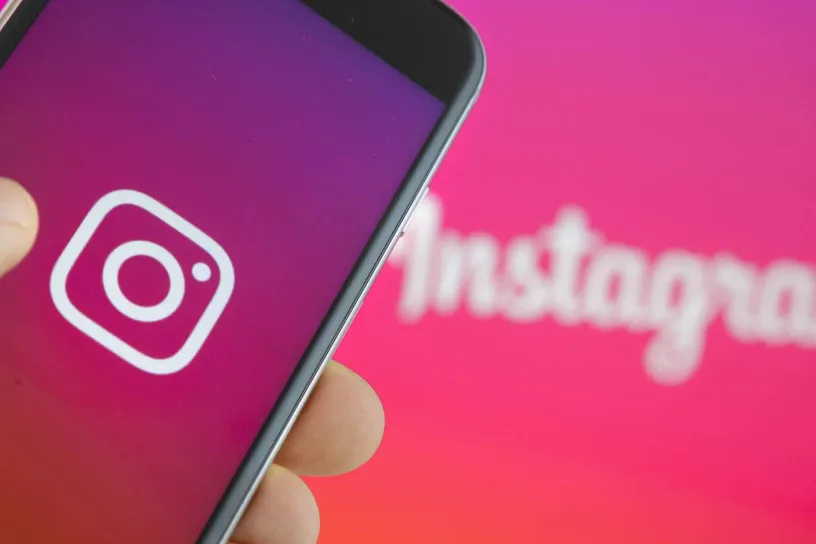 Instagram logo in phone