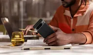 man holding Pixel 8 smartphone