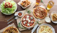 pizza on white ceramic plate